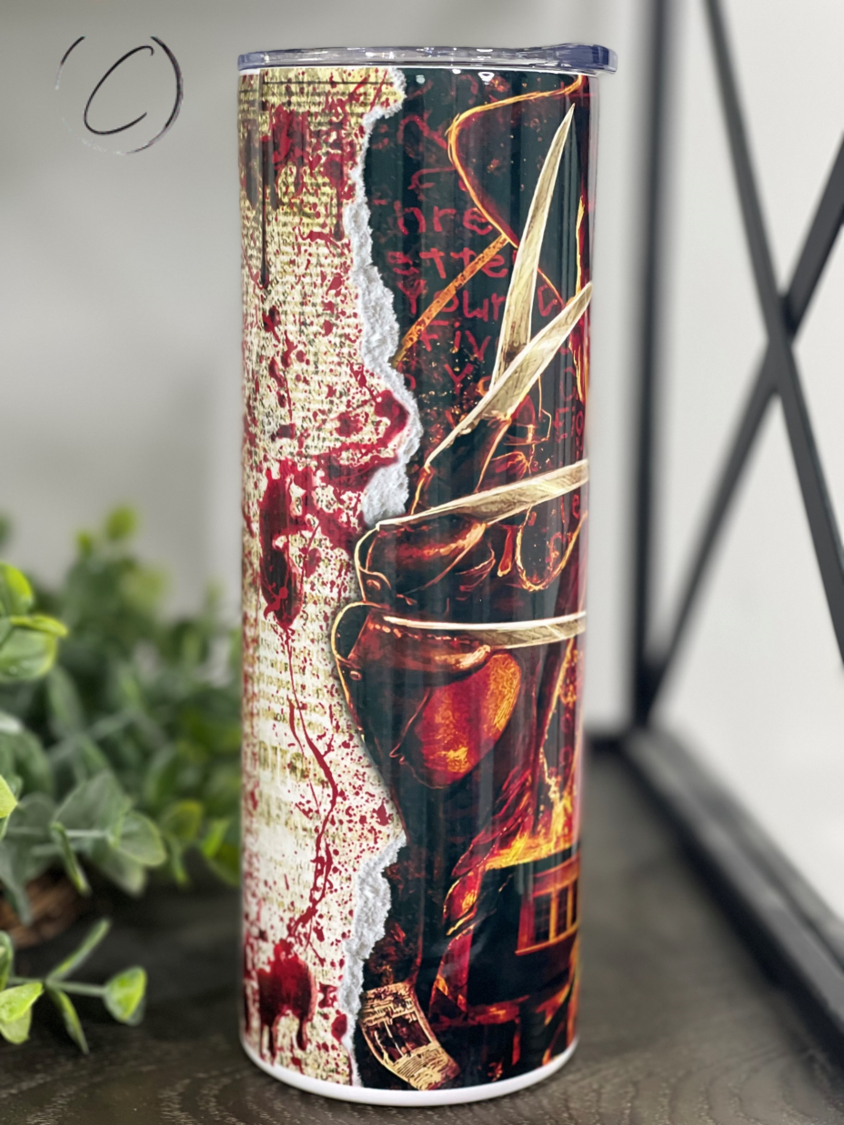 Freddy Krueger Bloody Paper 20oz Skinny Tumbler featuring a horror-themed design with a bloody paper motif.