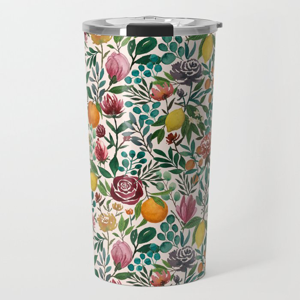 A vibrant 20oz stainless steel travel mug featuring a colorful fruit and flower design, perfect for hot or cold beverages.