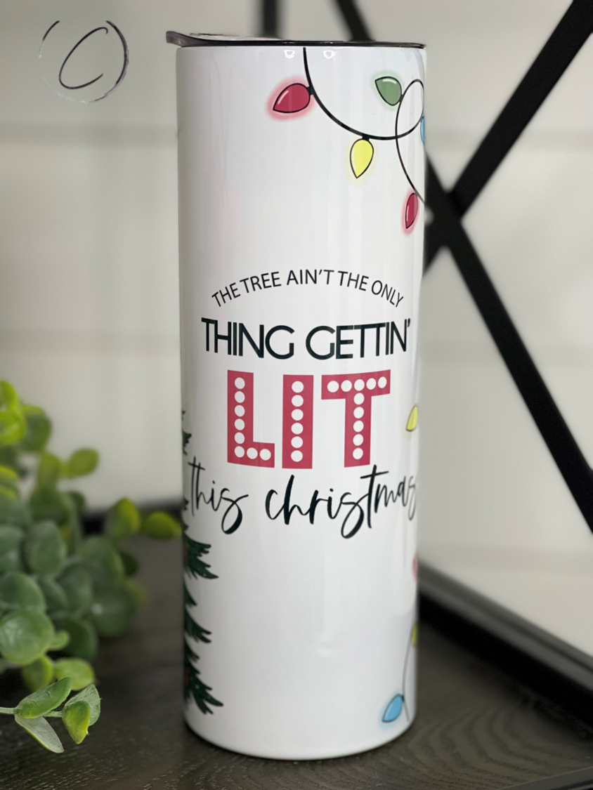 Gettin' Lit 20oz Skinny Tumbler with a stylish design, perfect for hot and cold beverages, featuring a reusable straw.