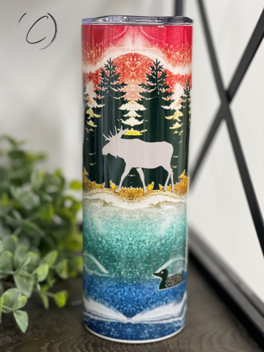 Glitter Moose 20oz Skinny Tumbler featuring a vibrant moose design with glitter accents, perfect for hot and cold beverages.