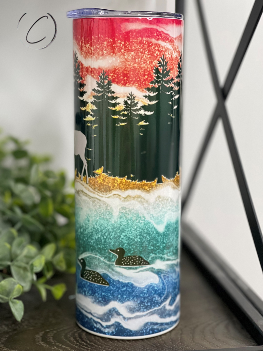 Glitter Moose 20oz Skinny Tumbler featuring a vibrant moose design with glitter accents, perfect for hot and cold beverages.