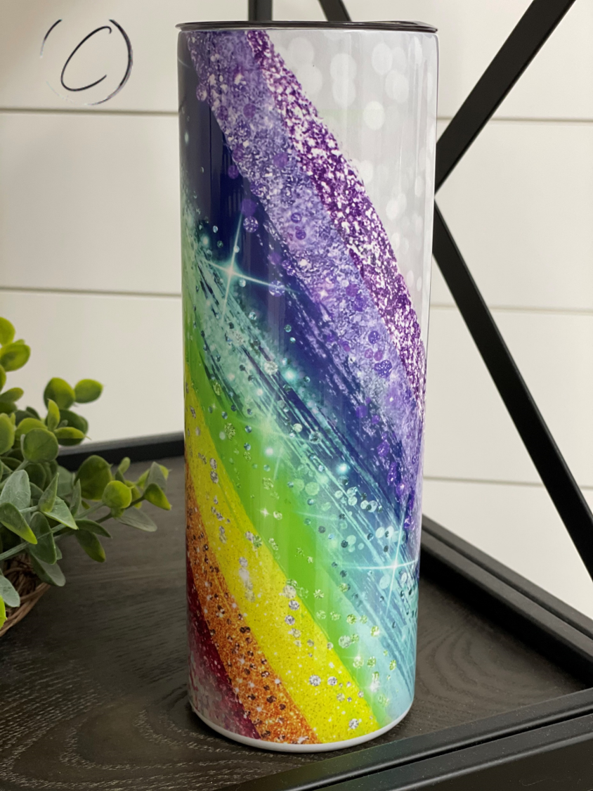 Glitter Rainbow 20oz Skinny Tumbler with vibrant colors and reusable straw, showcasing a full wrap design.