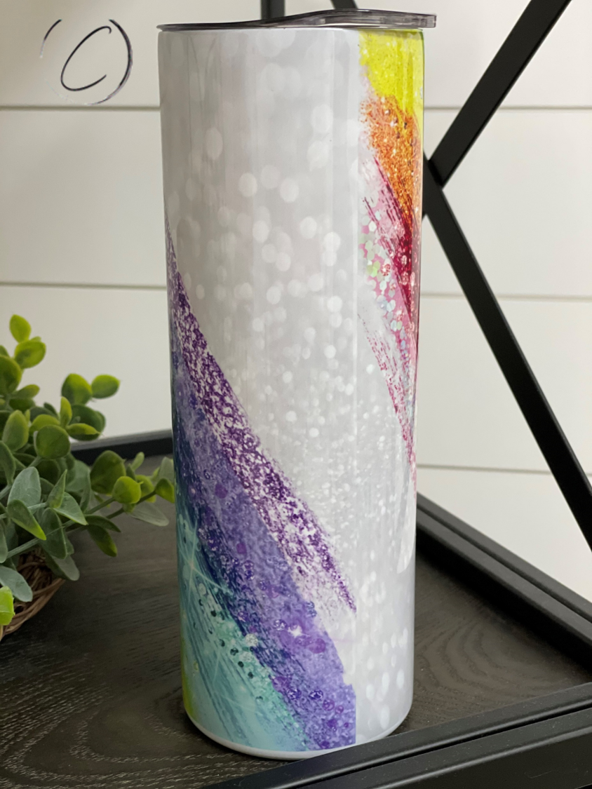 Glitter Rainbow 20oz Skinny Tumbler with vibrant colors and reusable straw, showcasing a full wrap design.