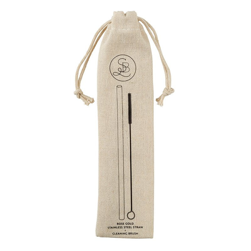 Gold stainless steel straw and brush set in a linen drawstring bag, showcasing eco-friendly design and elegant finish.