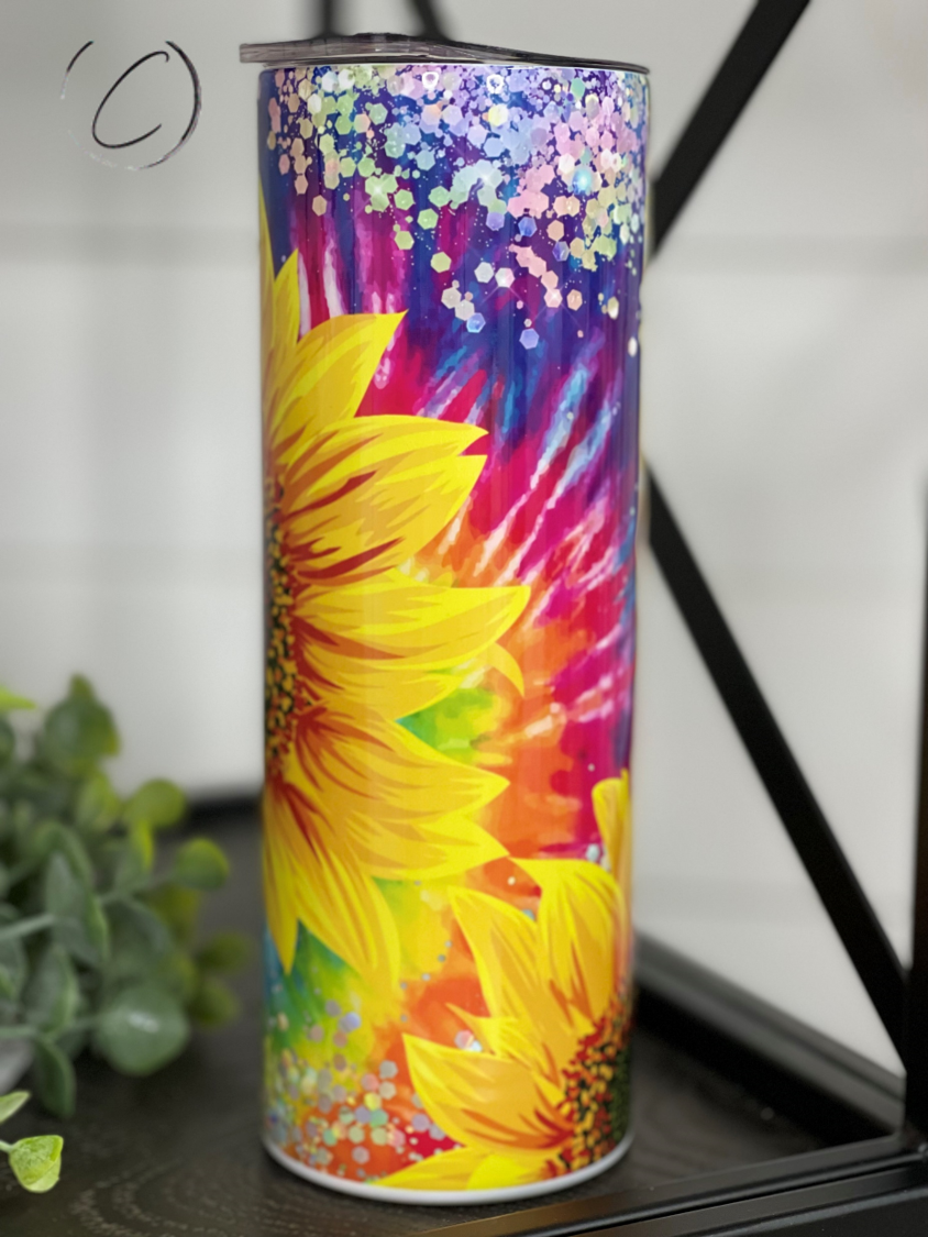 Groovy Sunflower 20oz Skinny Tumbler with vibrant sunflower design and reusable straw.