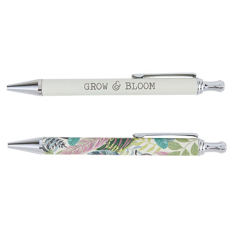 Grow & Bloom Pen Set of 2 featuring a white pen with 'Grow and Bloom' text and a colorful foliage print pen in teal, pink, and green, elegantly boxed.