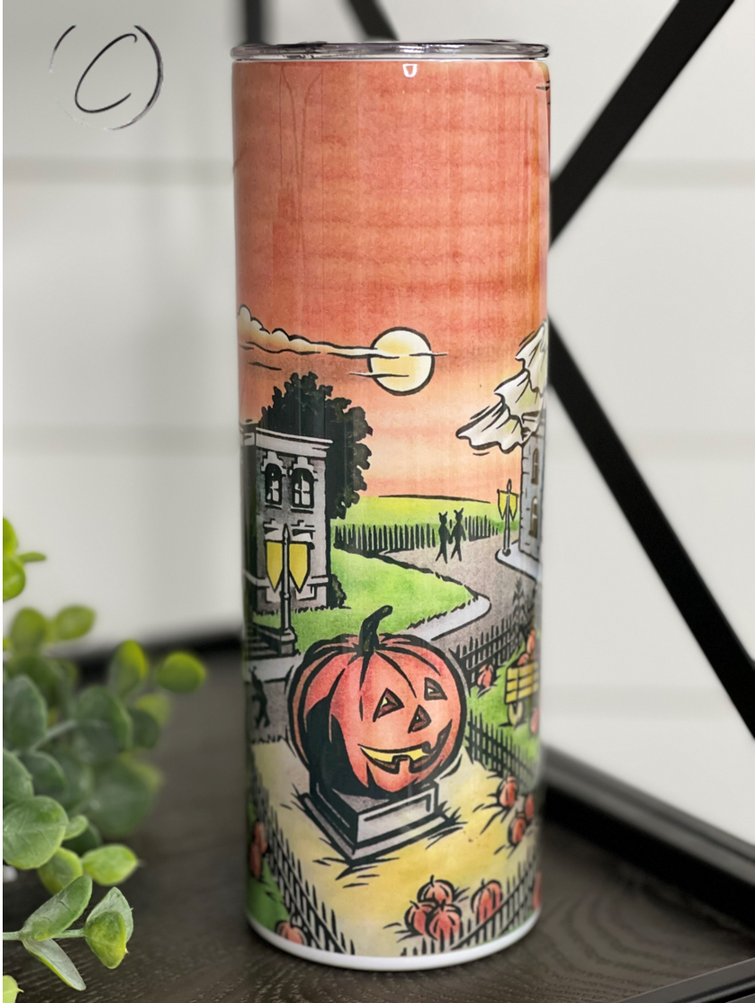 Halloweentown 20oz Skinny Tumbler featuring a vibrant Halloween-themed design, complete with a reusable straw.