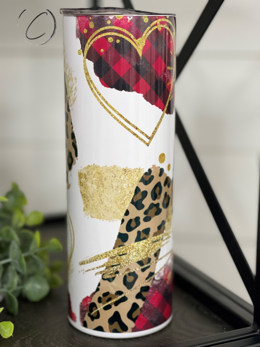 Hello Love 20oz Skinny Tumbler with a vibrant full wrap design, includes a reusable straw.