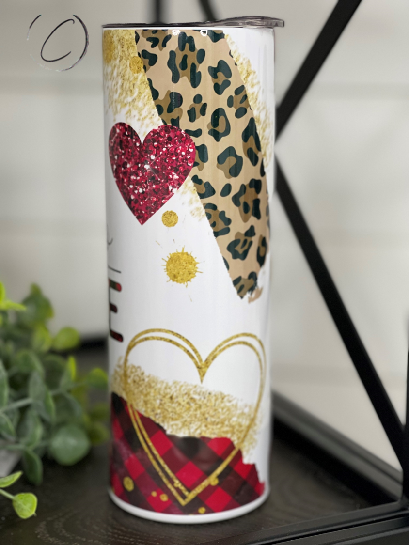 Hello Love 20oz Skinny Tumbler with a vibrant full wrap design, includes a reusable straw.