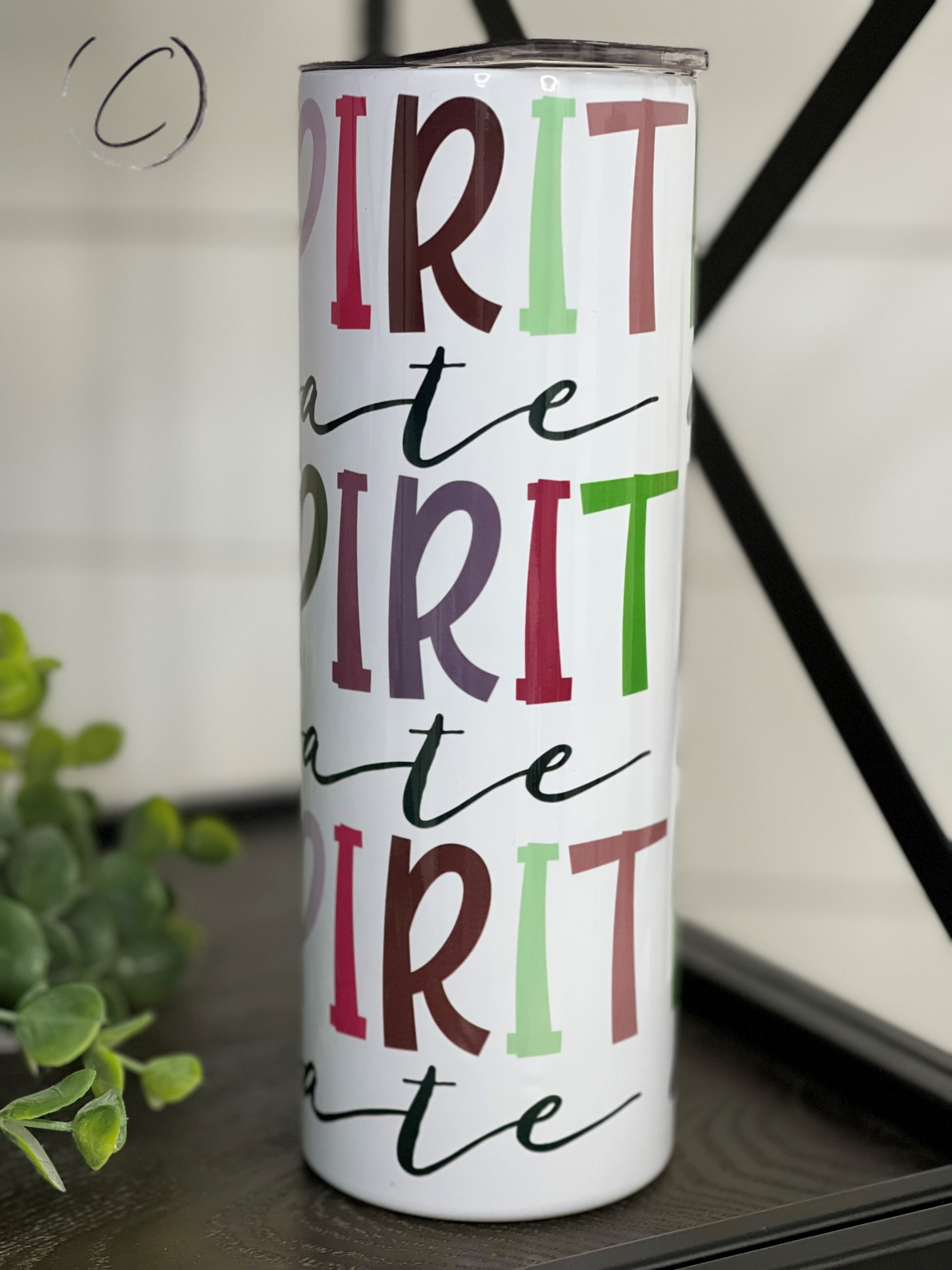 Holy Spirit Activate 20oz Skinny Tumbler with vibrant design and reusable straw, showcasing durability and style.