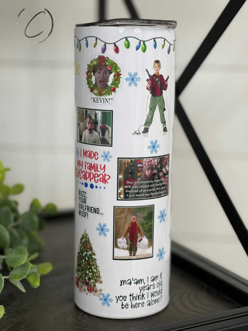 Home Alone 20oz Skinny Tumbler featuring a unique design, reusable straw, and durable construction.