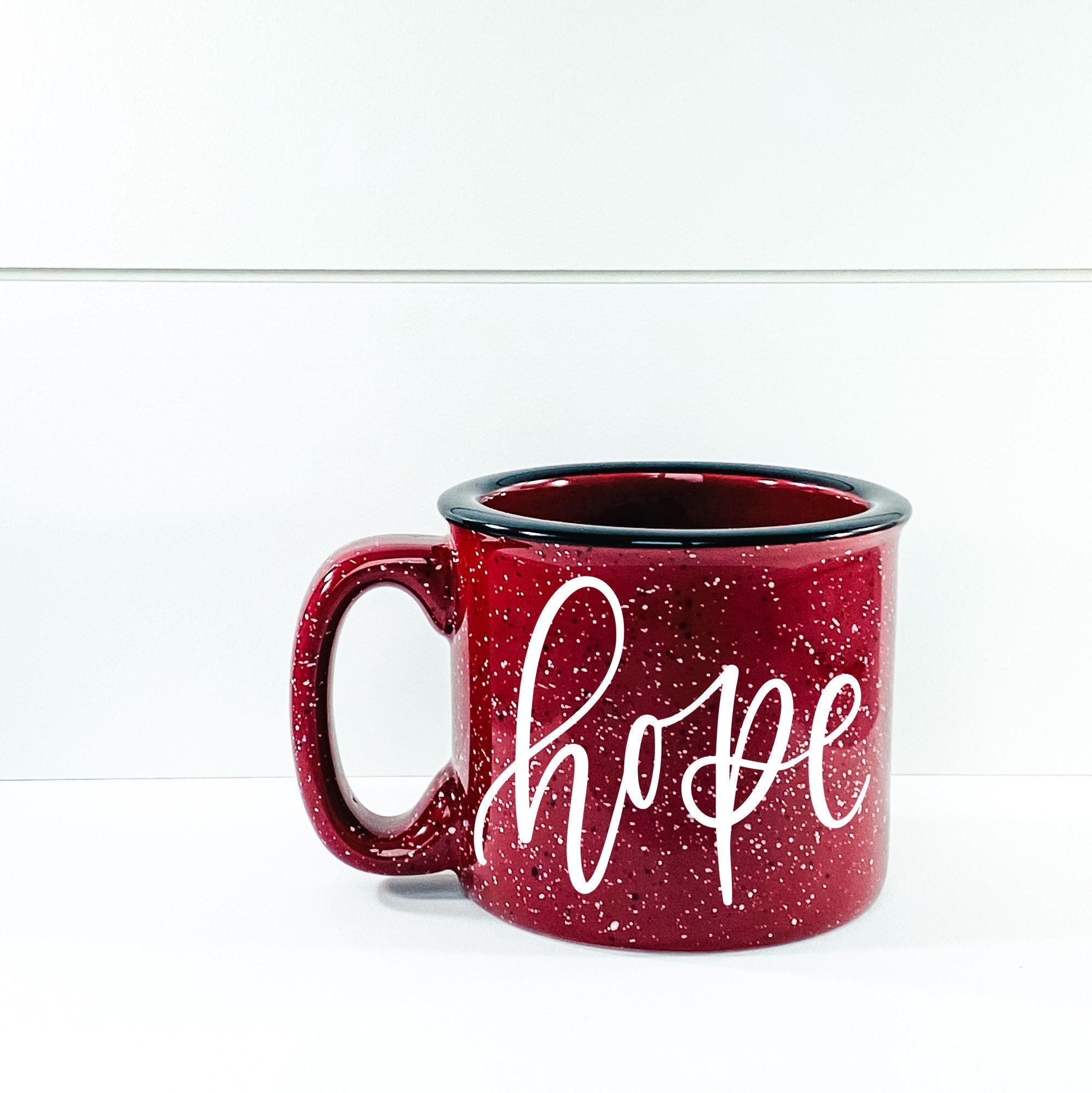 Hope Campfire Mug in ceramic with a vibrant design, perfect for outdoor and indoor use.