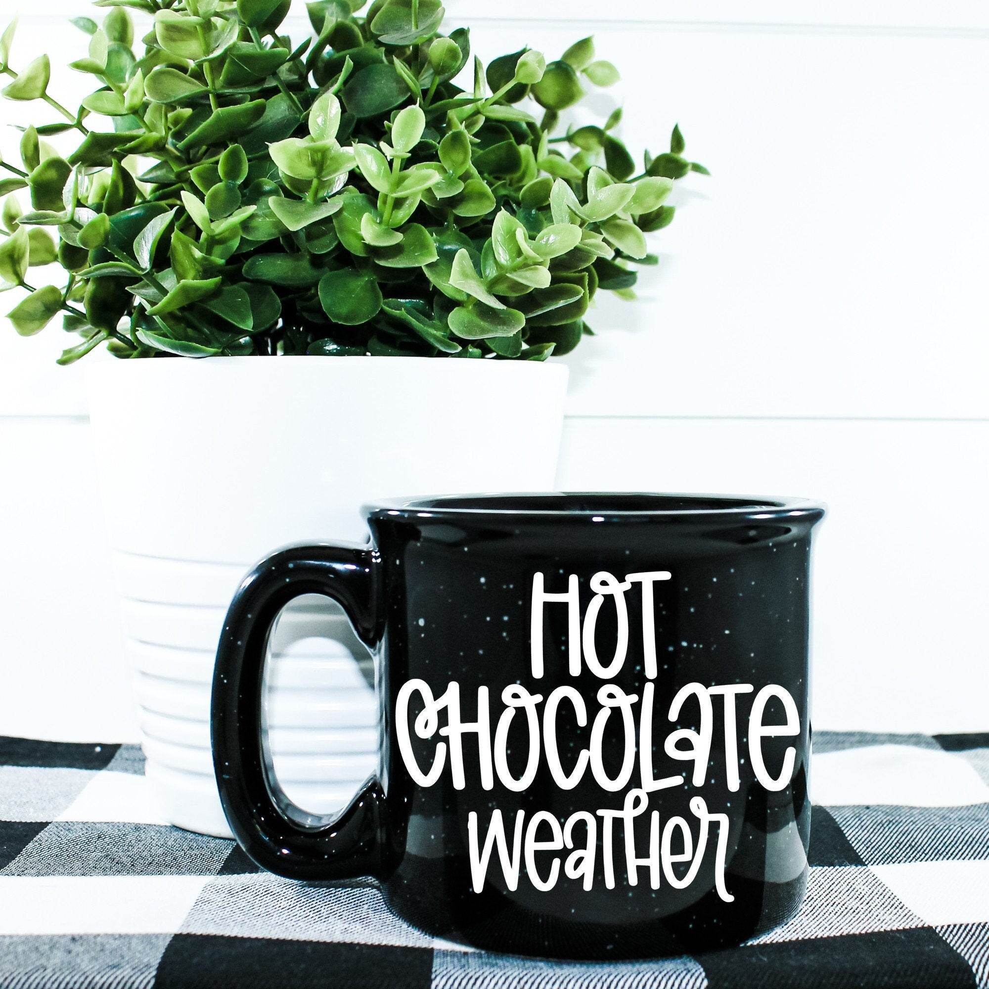 A cozy ceramic campfire mug designed for hot chocolate, featuring a vibrant vinyl design, perfect for chilly weather.