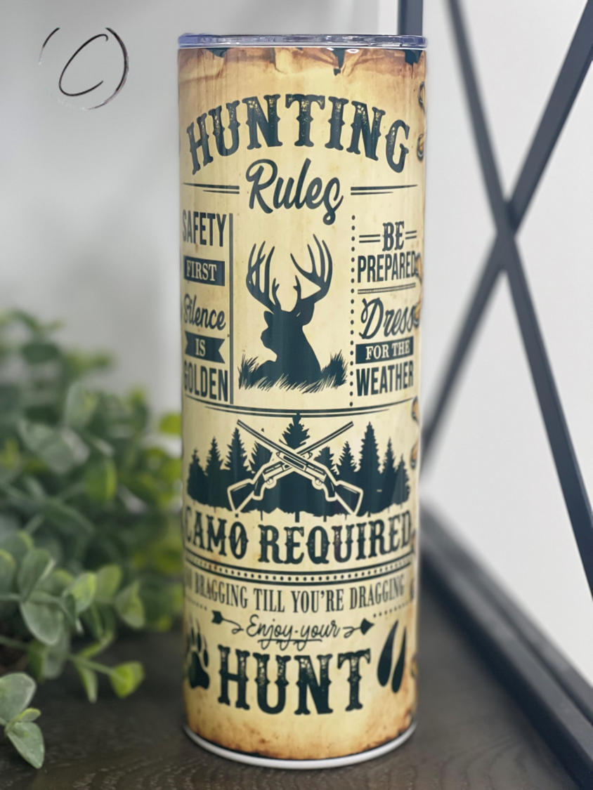 Hunting Rules 20oz Skinny Tumbler featuring a full wrap design with hunting-themed graphics and a reusable straw.