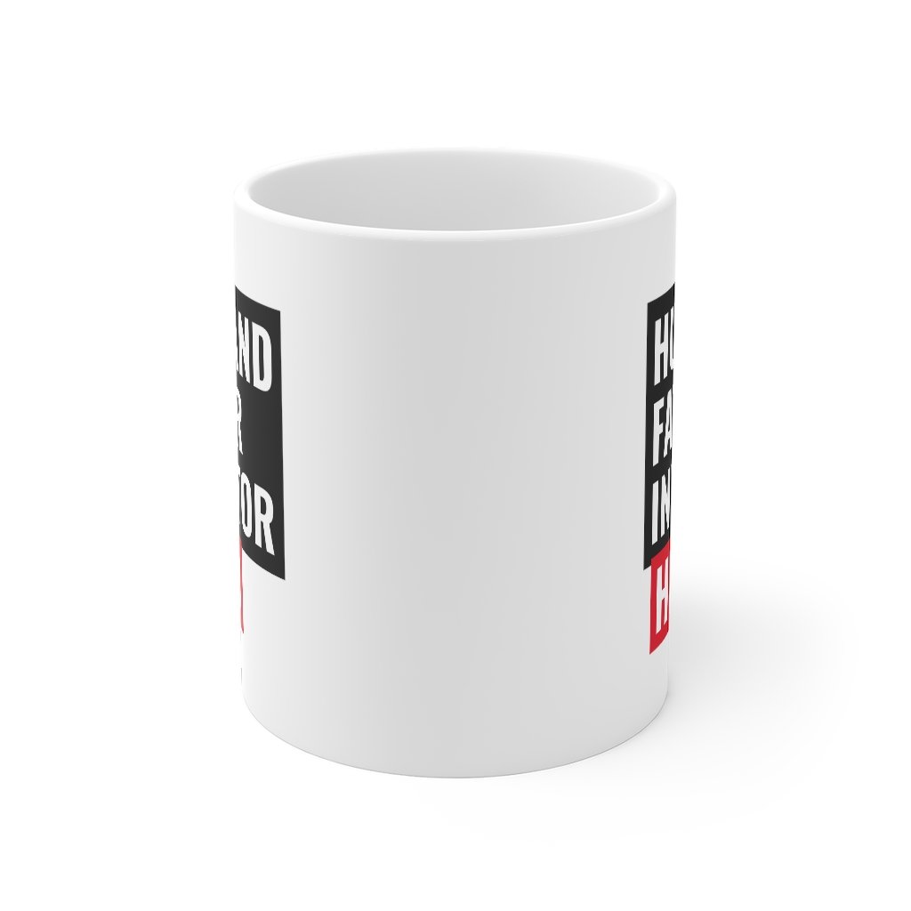 A white ceramic mug featuring the text 'Husband, Father, Investor, Hero' with a classic rounded design and C-handle.