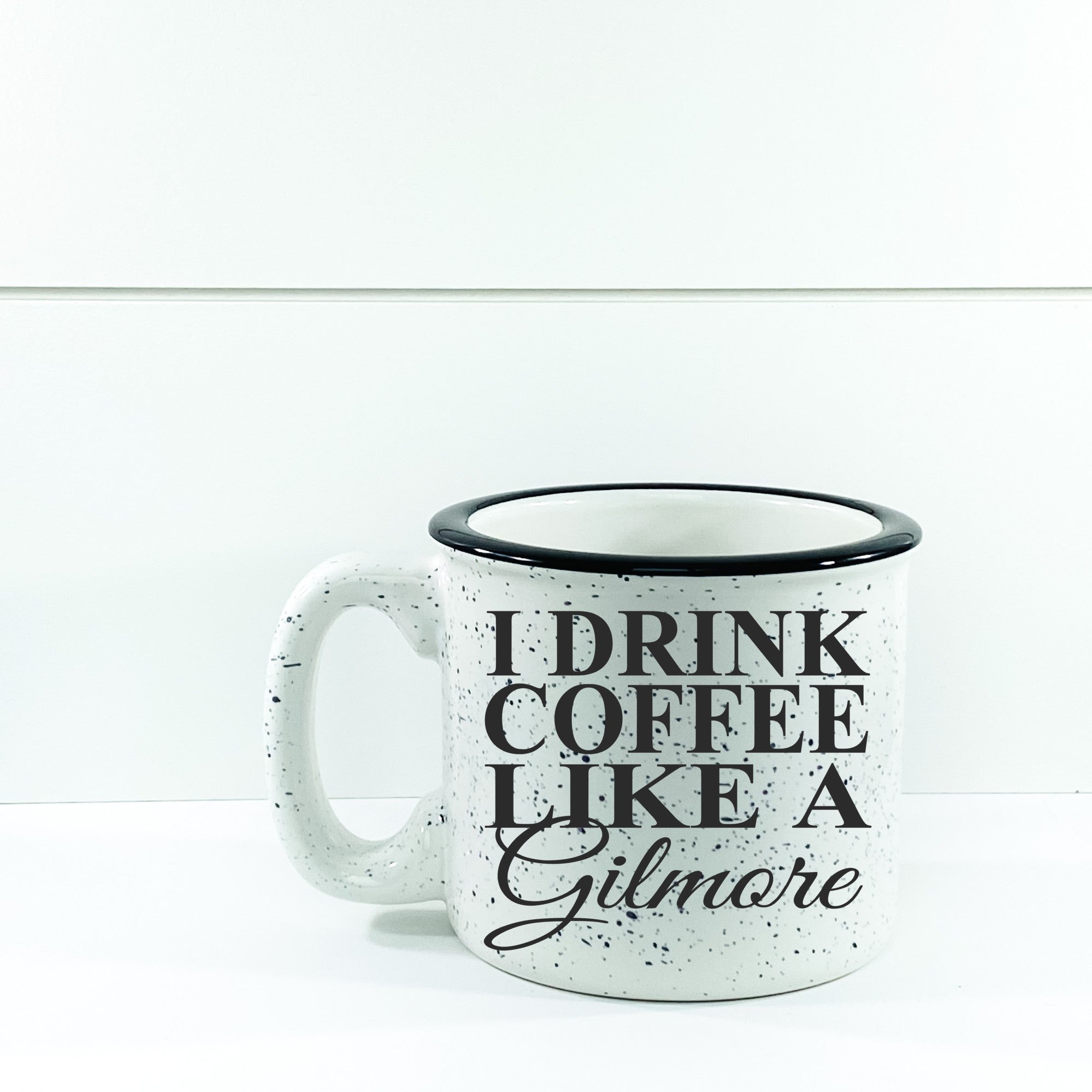 Ceramic campfire mug with 'I Drink Coffee Like A Gilmore' design, perfect for cozy beverages.