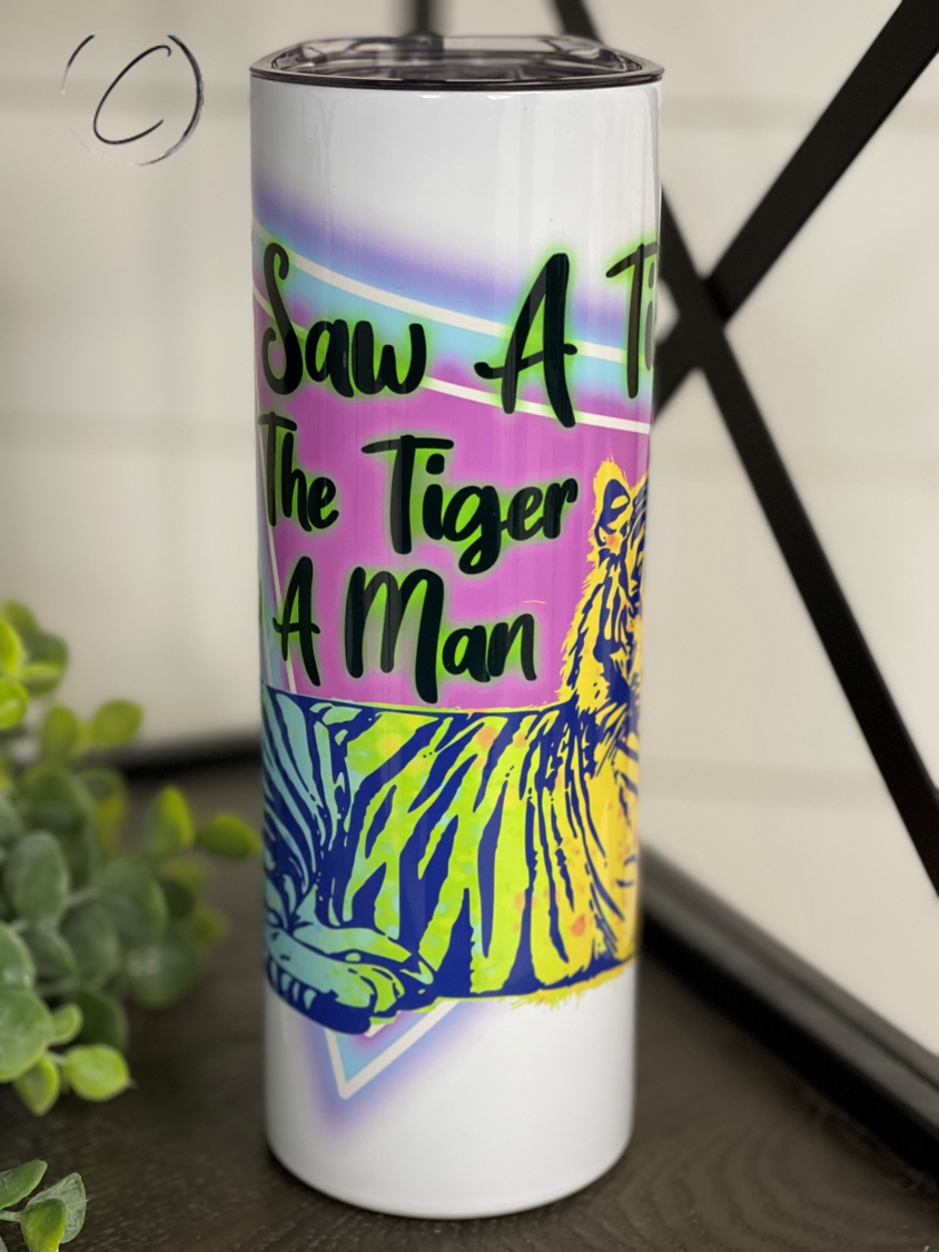 I Saw Tiger 20oz Skinny Tumbler featuring a vibrant tiger design, reusable straw, and sleek insulated body.