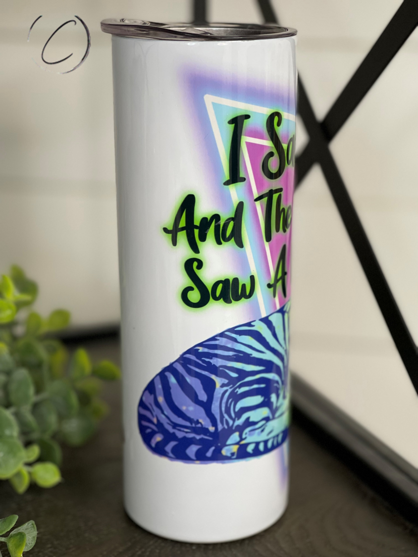 I Saw Tiger 20oz Skinny Tumbler featuring a vibrant tiger design, reusable straw, and sleek insulated body.