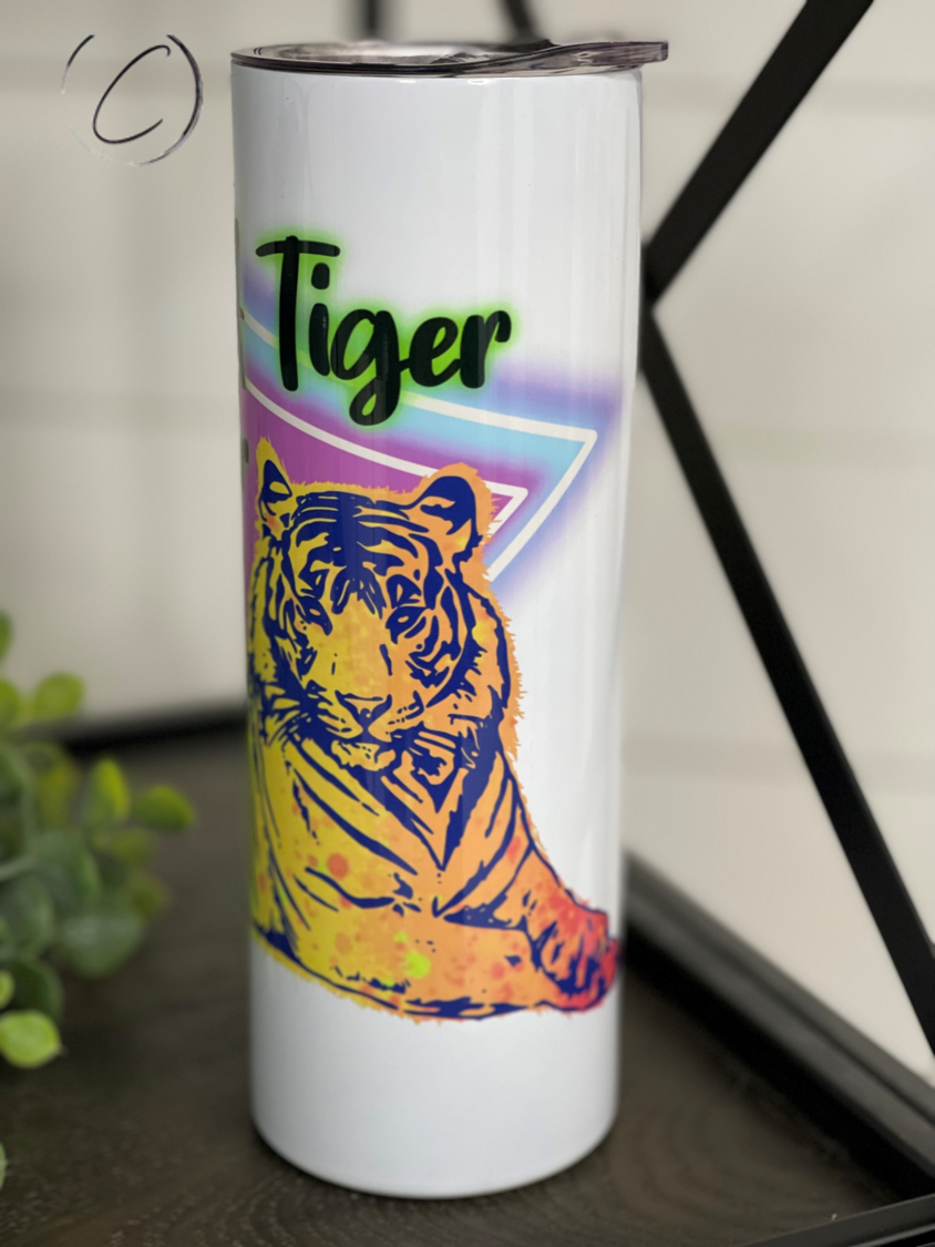 I Saw Tiger 20oz Skinny Tumbler featuring a vibrant tiger design, reusable straw, and sleek insulated body.