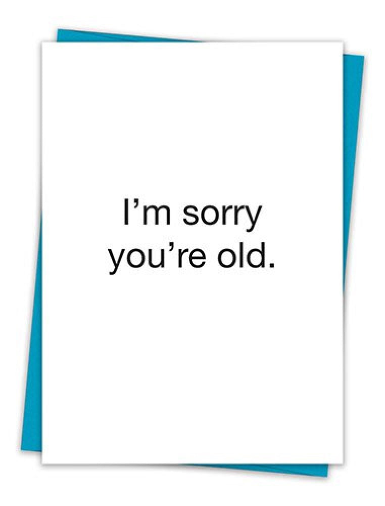 A humorous birthday greeting card that reads 'I'm Sorry You're Old' with a teal envelope, featuring minimalist design and eco-friendly materials.