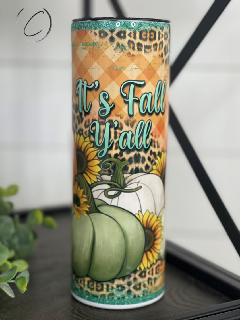 It's Fall Y'all 20oz Skinny Tumbler featuring a vibrant autumn design, complete with a reusable straw.