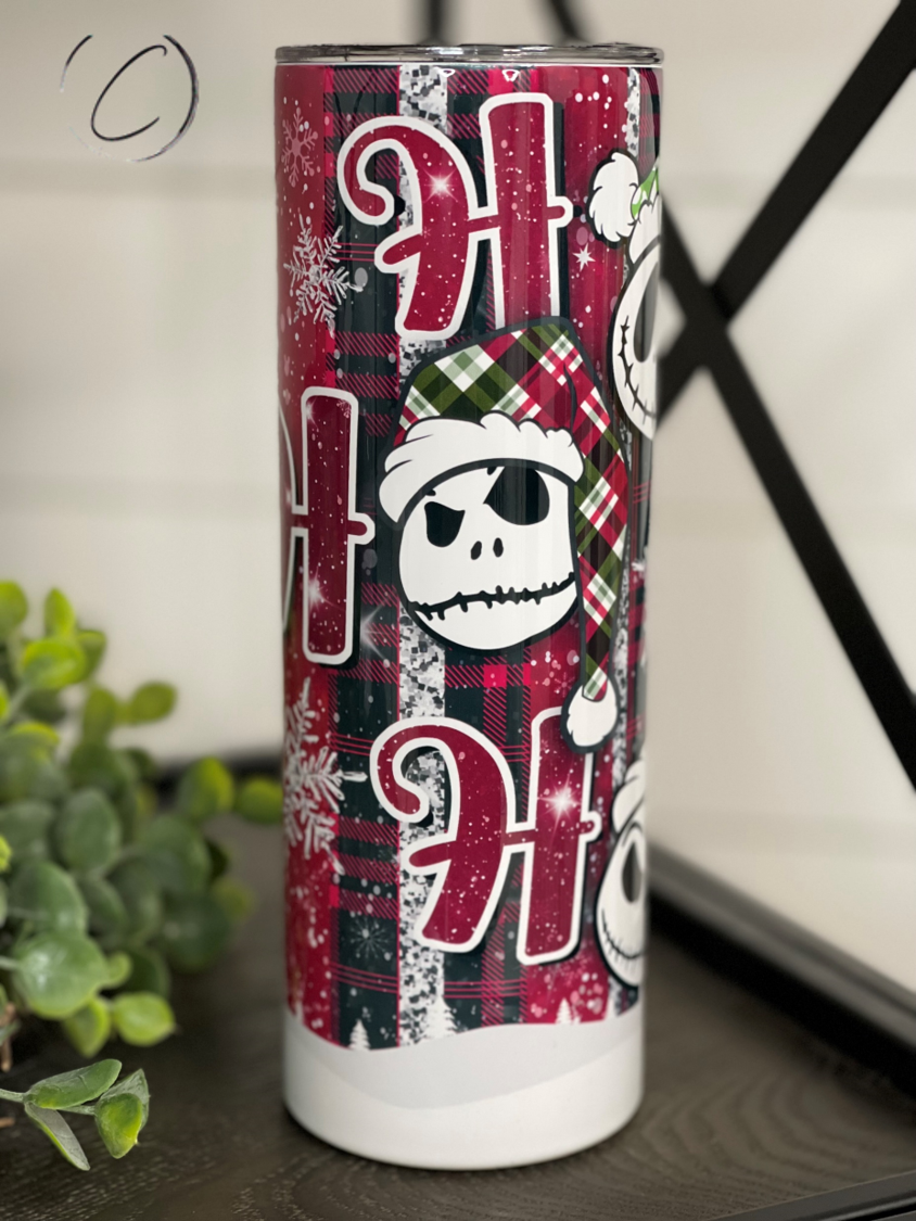 Jack Skellington Ho Ho Ho 20oz skinny tumbler featuring a festive design, perfect for hot and cold beverages.