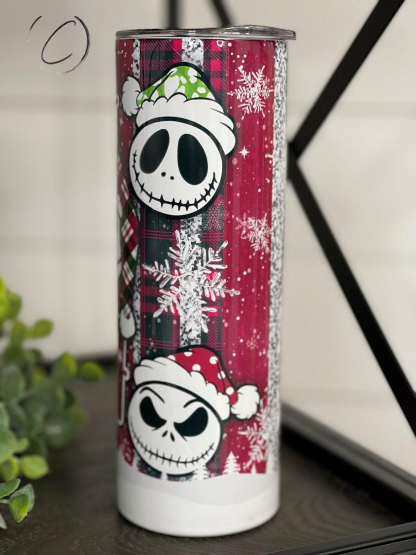 Jack Skellington Ho Ho Ho 20oz skinny tumbler featuring a festive design, perfect for hot and cold beverages.