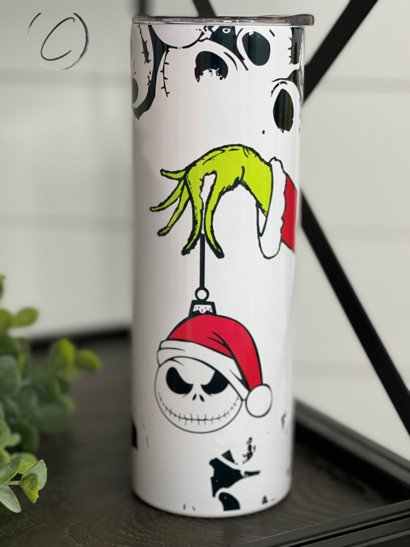 Jack Skellington Ornament 20oz Skinny Tumbler featuring a full wrap design with vibrant colors and a reusable straw.