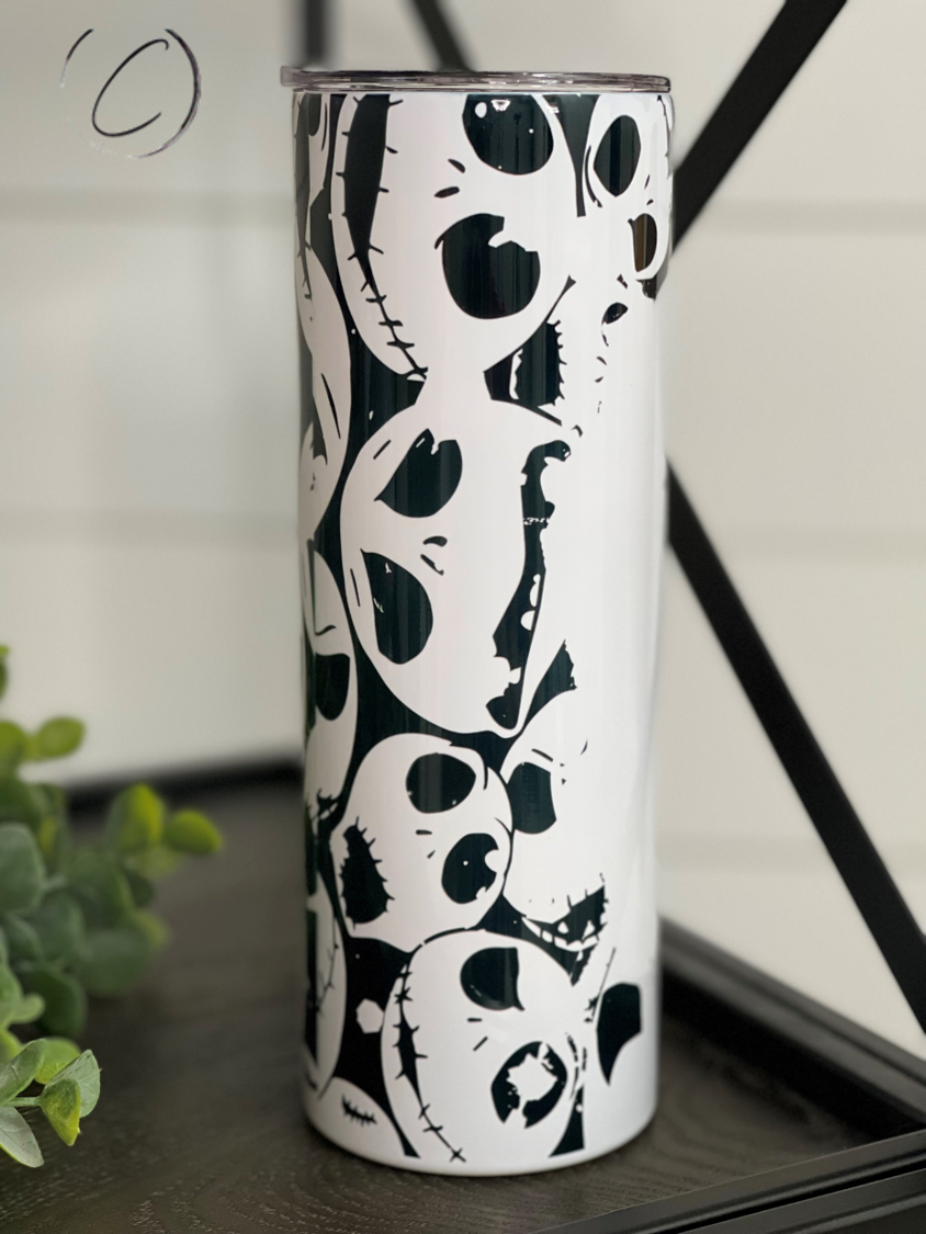 Jack Skellington Ornament 20oz Skinny Tumbler featuring a full wrap design with vibrant colors and a reusable straw.