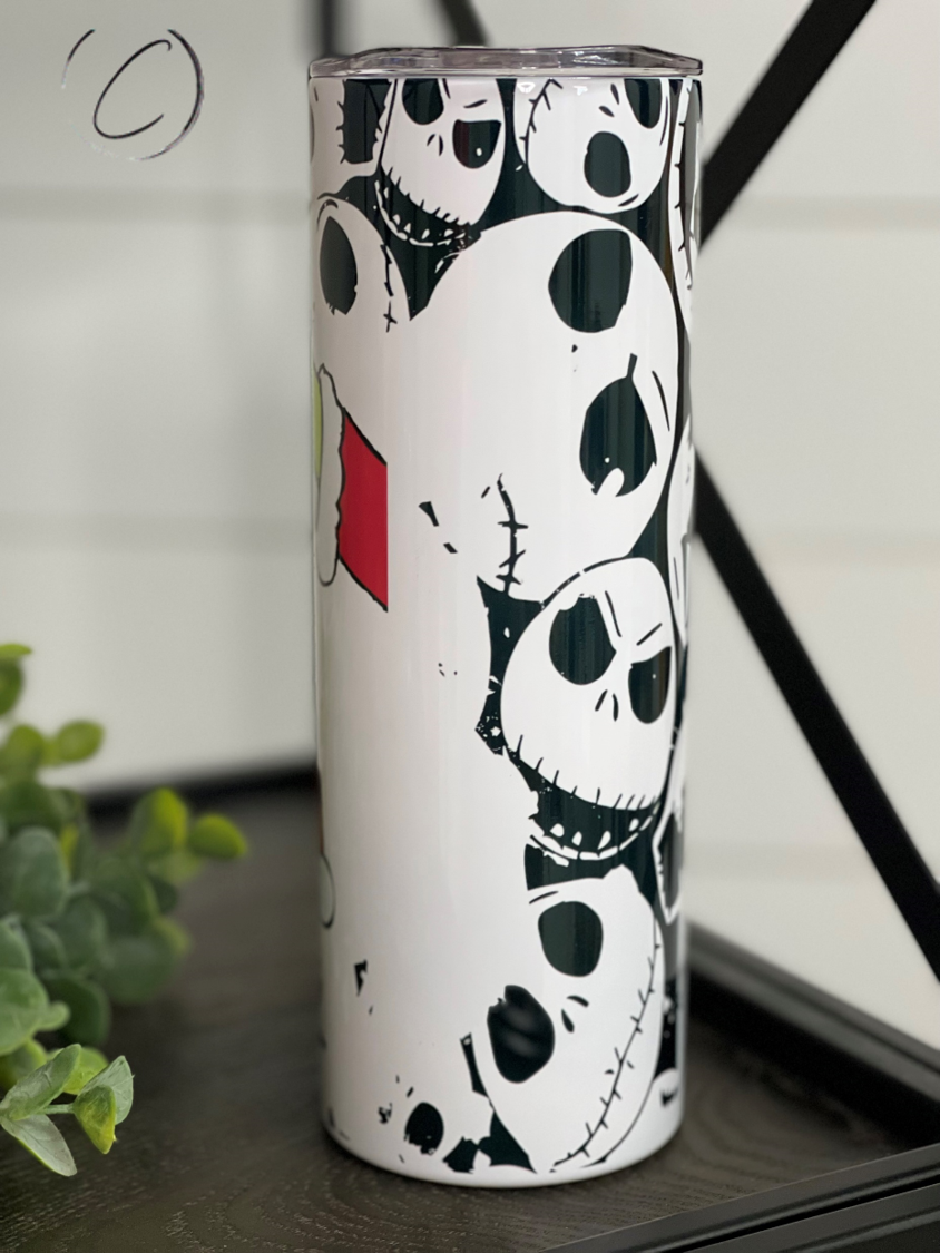 Jack Skellington Ornament 20oz Skinny Tumbler featuring a full wrap design with vibrant colors and a reusable straw.