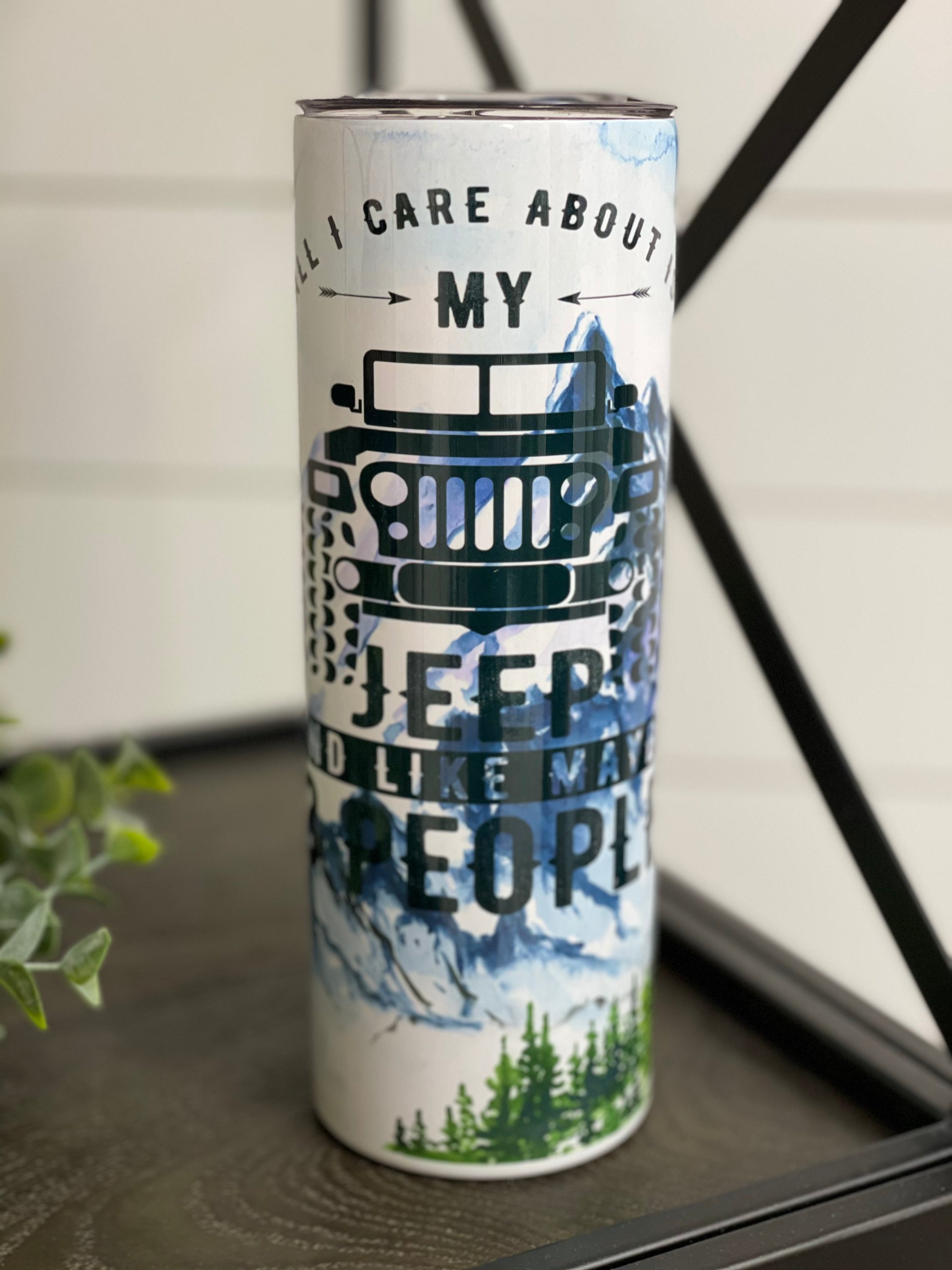 Jeep Care 20oz Skinny Tumbler featuring a durable full wrap design and a reusable straw, perfect for on-the-go hydration.