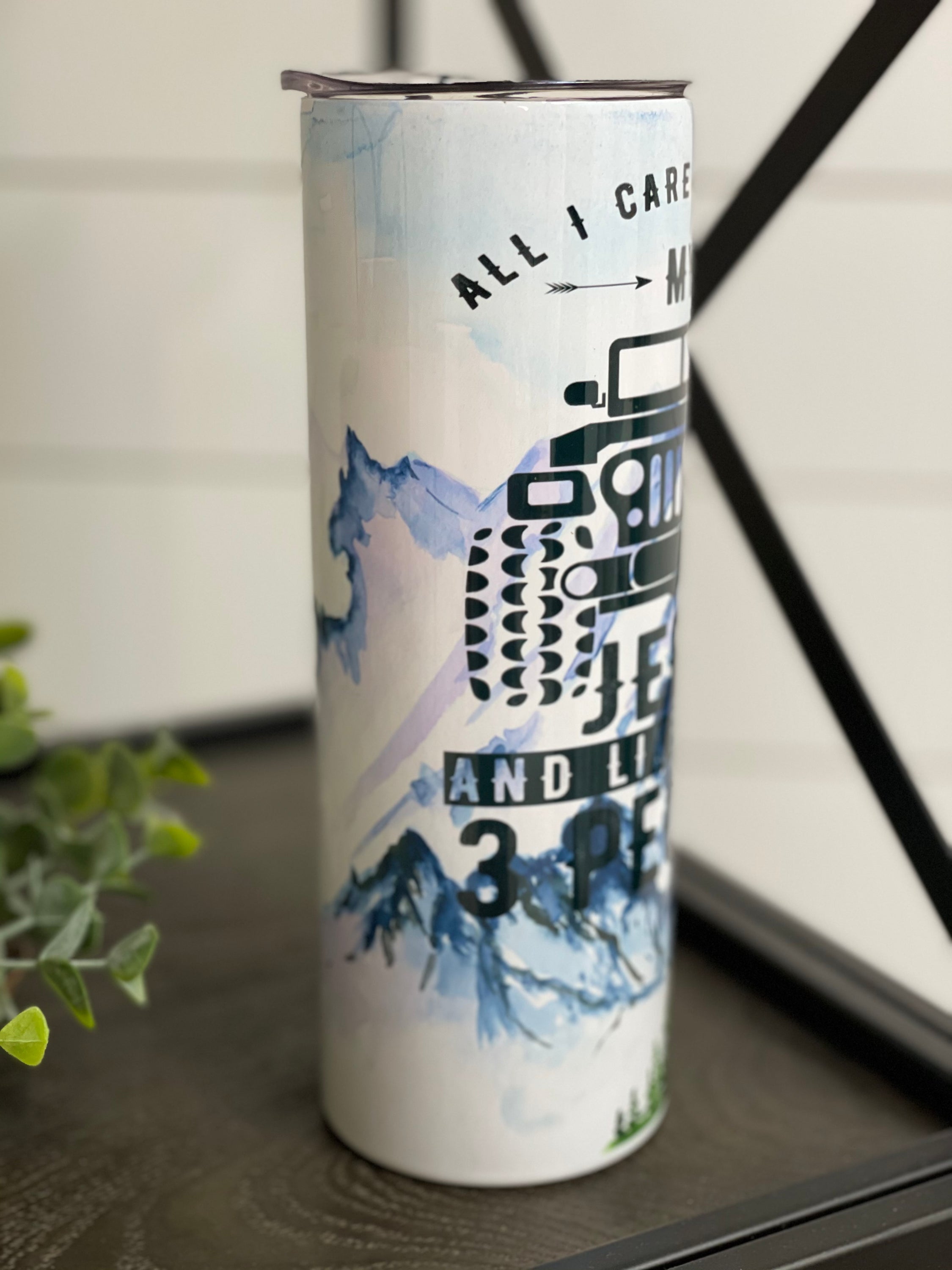 Jeep Care 20oz Skinny Tumbler featuring a durable full wrap design and a reusable straw, perfect for on-the-go hydration.