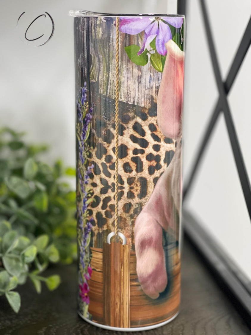 Lavender Leopard Piglet 20oz Skinny Tumbler with a stylish leopard print design and reusable straw.