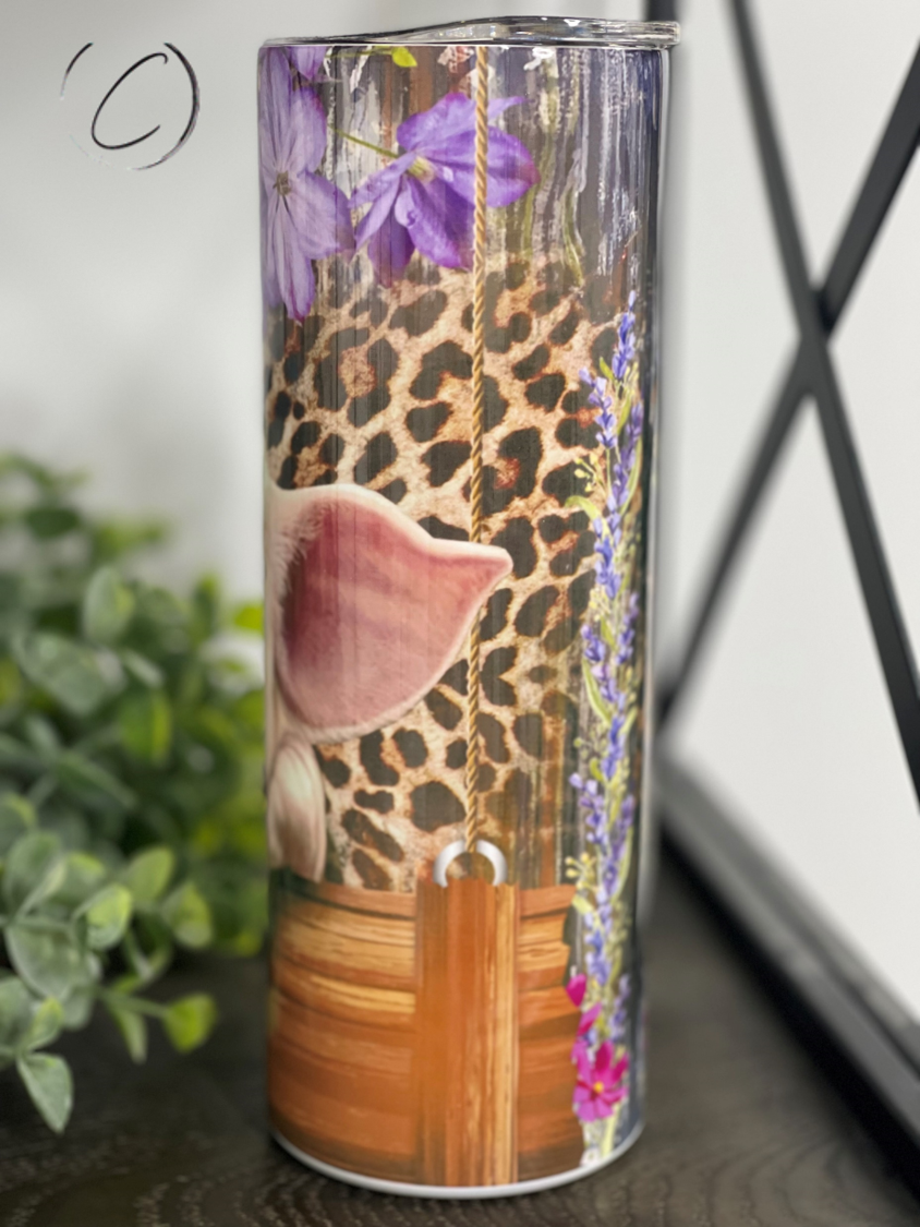 Lavender Leopard Piglet 20oz Skinny Tumbler with a stylish leopard print design and reusable straw.