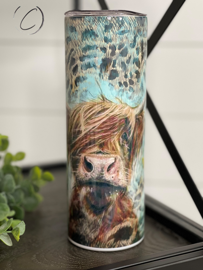 Leopard Highland Cow 20oz Skinny Tumbler with a unique full wrap design featuring a stylish leopard cow pattern.