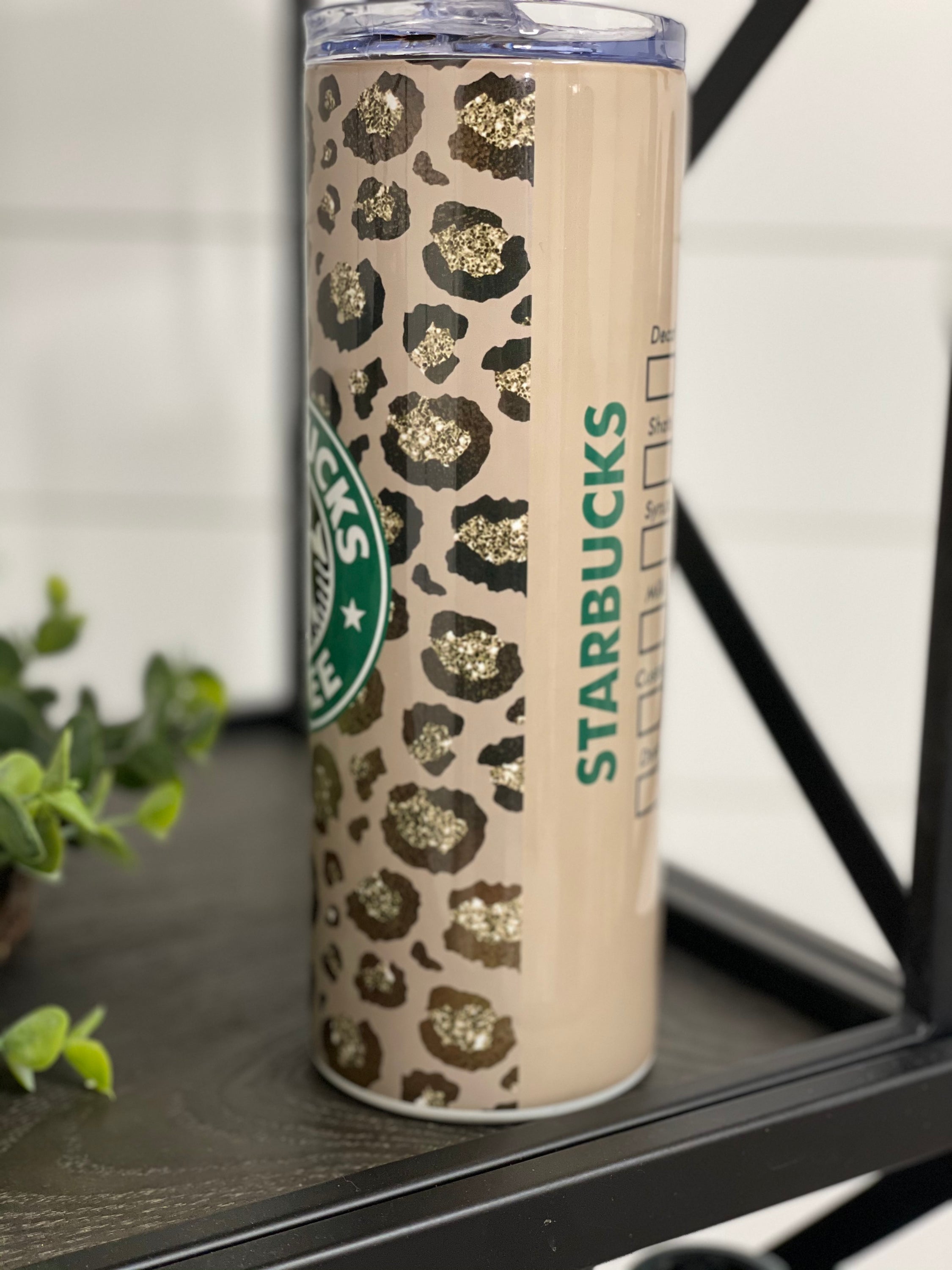 Leopard Starbucks 20oz Skinny Tumbler with reusable straw, featuring a stylish full wrap leopard print design.