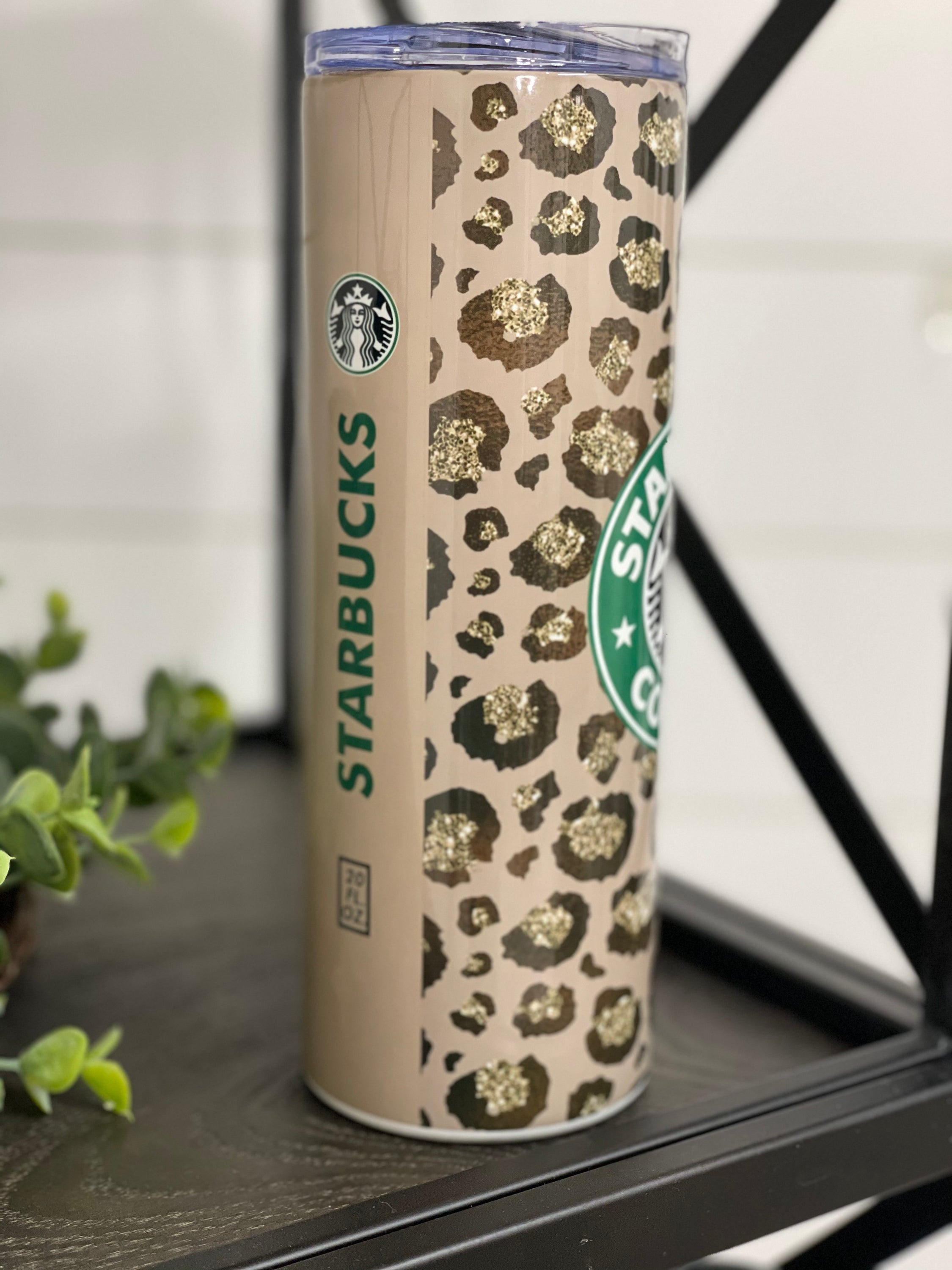 Leopard Starbucks 20oz Skinny Tumbler with reusable straw, featuring a stylish full wrap leopard print design.