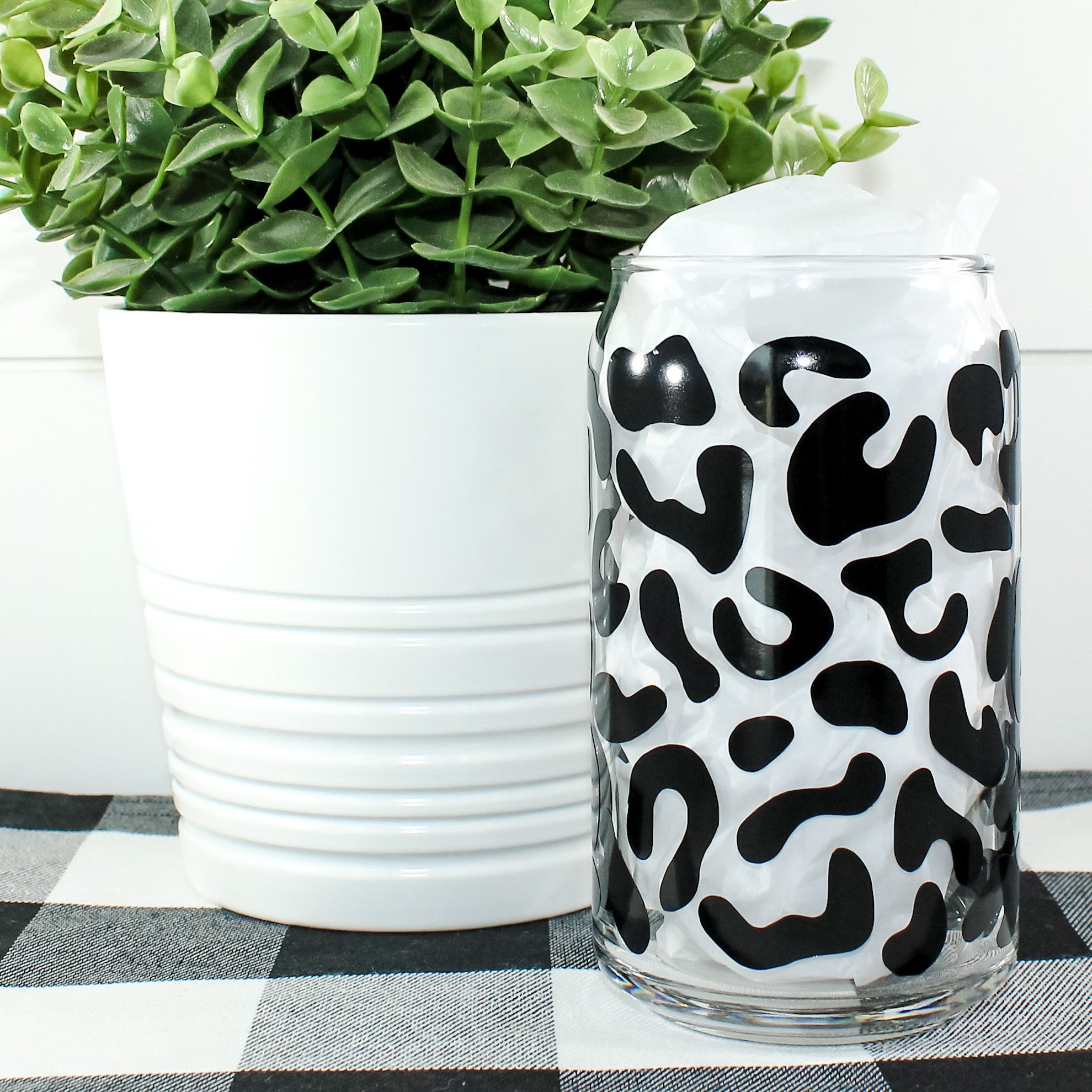 Leopard Wrapped Can Glass showcasing a stylish leopard print design, perfect for drinks.