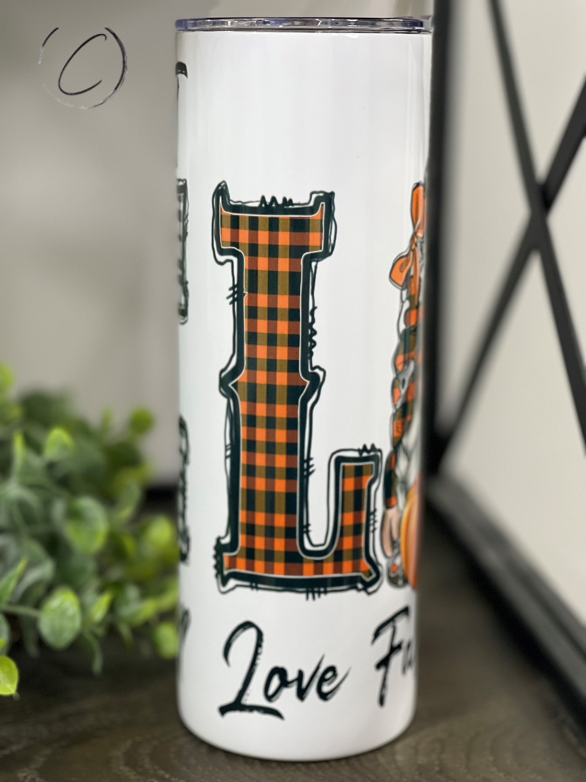 Love Fall Most Of All Gnomes 20oz Skinny Tumbler featuring a charming gnome design, perfect for fall beverages.