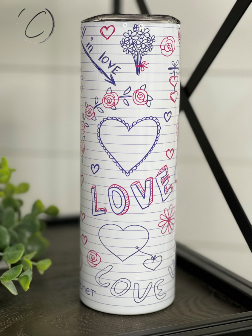 Love Notes 20oz Skinny Tumbler with a vibrant full wrap design, featuring a reusable straw and a sleek, durable finish.