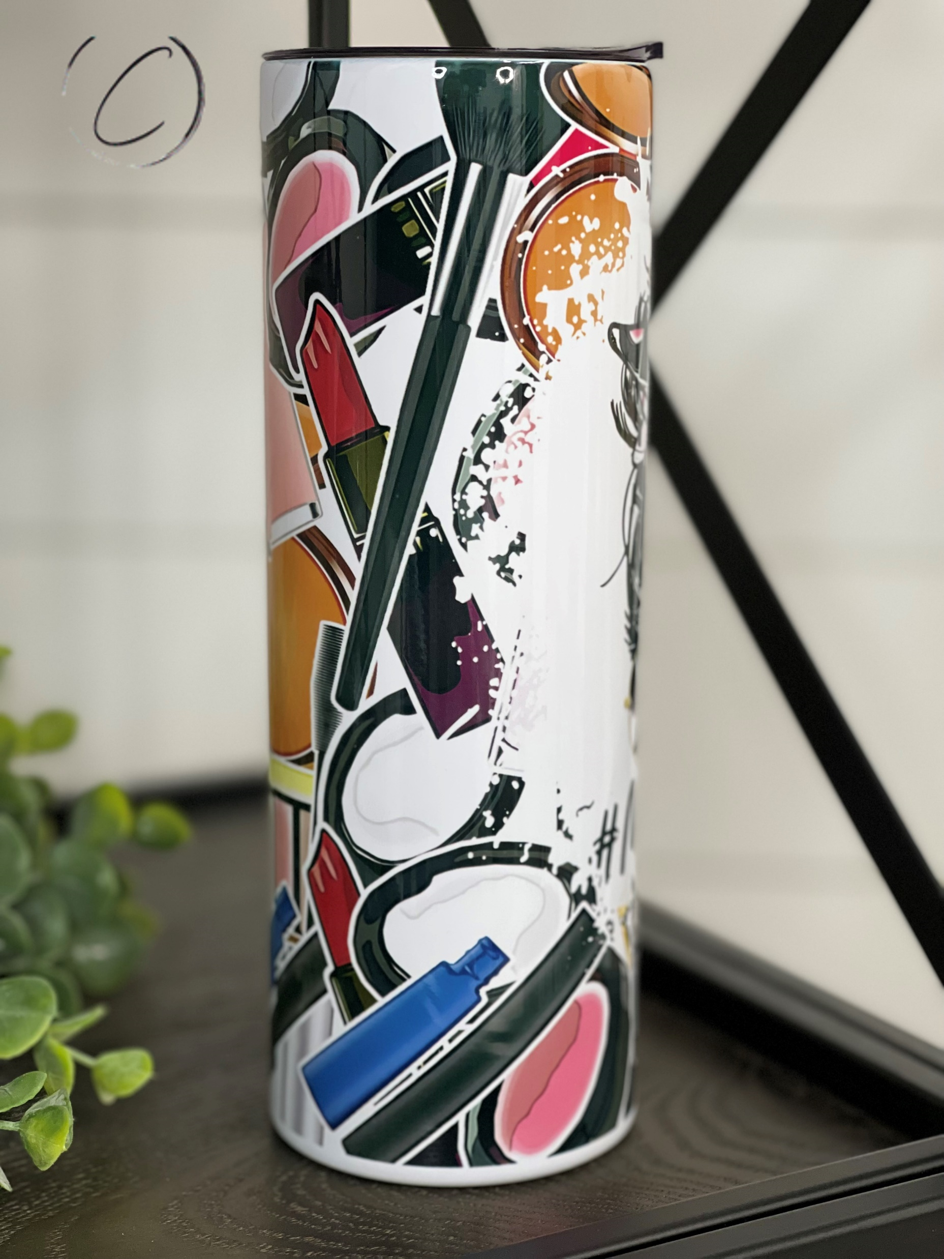 A stylish 20oz skinny tumbler with a vibrant #MakeupLife design, featuring a reusable straw and durable construction.