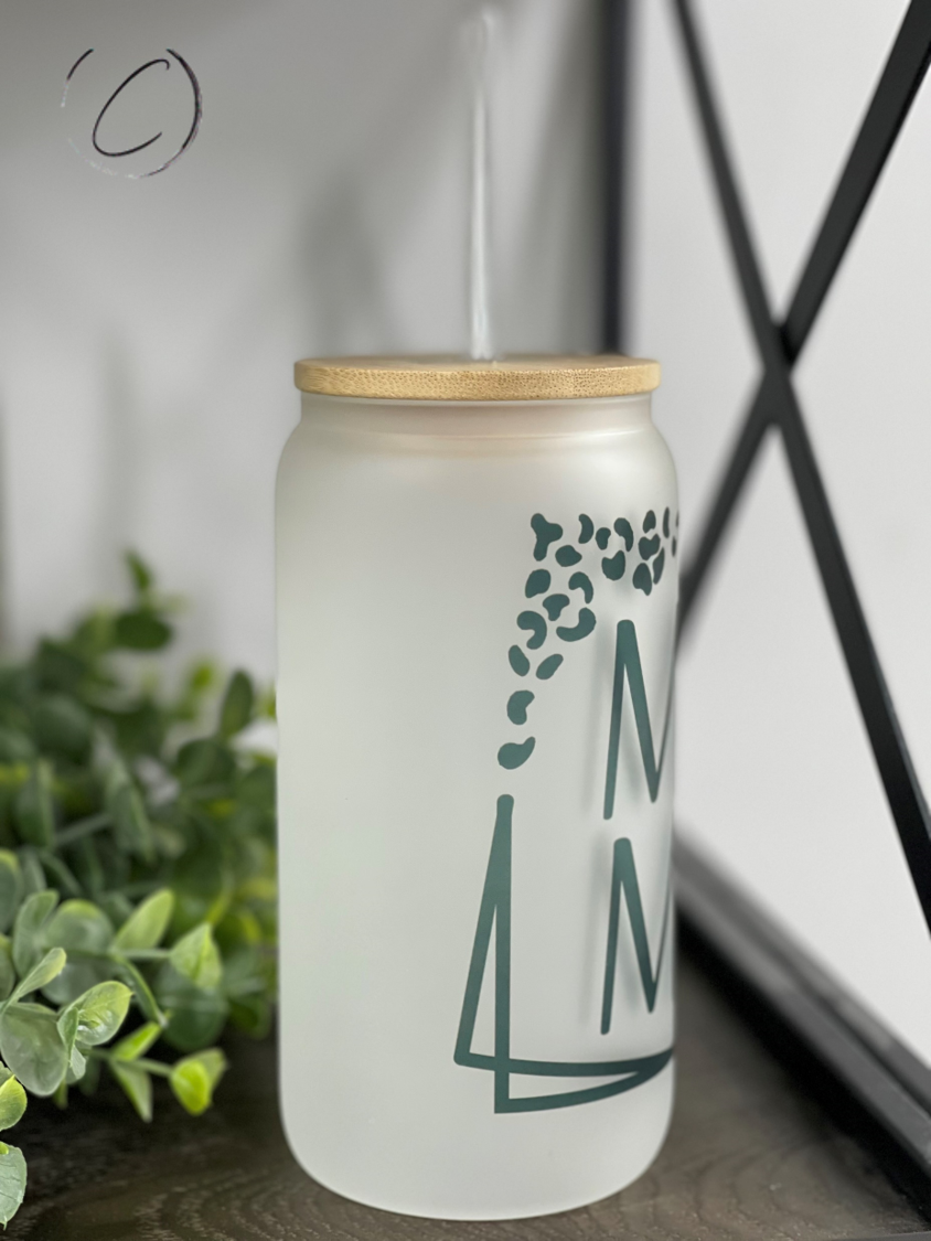 Mama Squared 16oz Libbey Glass tumbler with a reusable straw, showcasing a frost appearance and unique full wrap design.