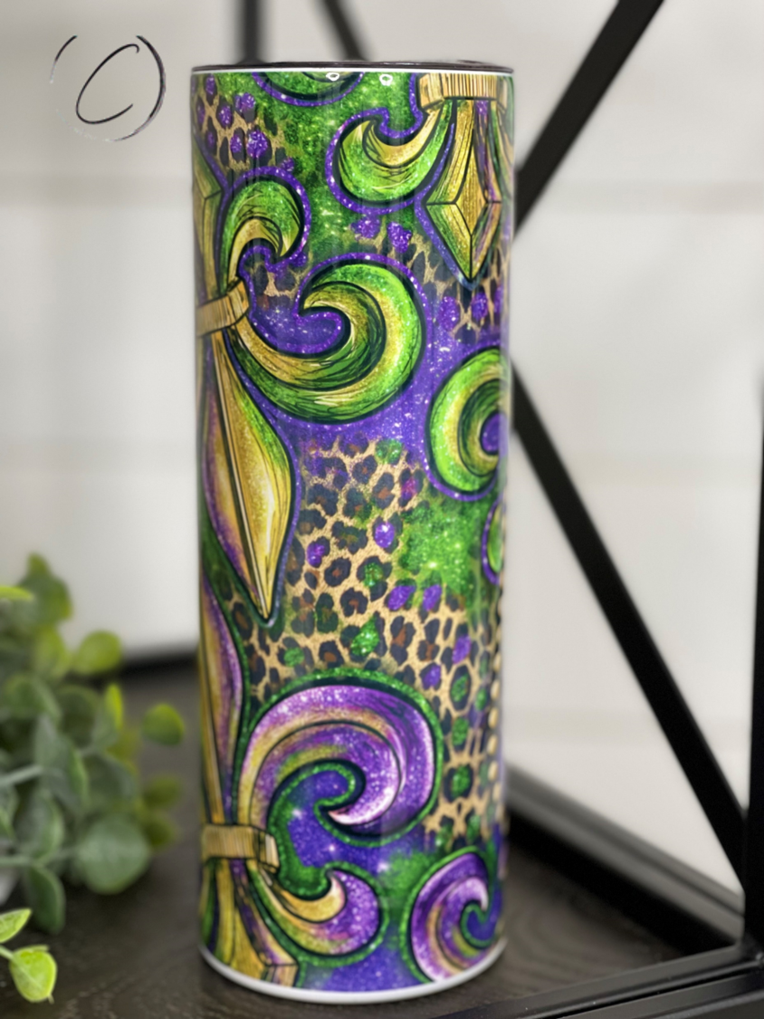 Mardi Gras Fleur-de-lis 20oz Skinny Tumbler with vibrant design and reusable straw.