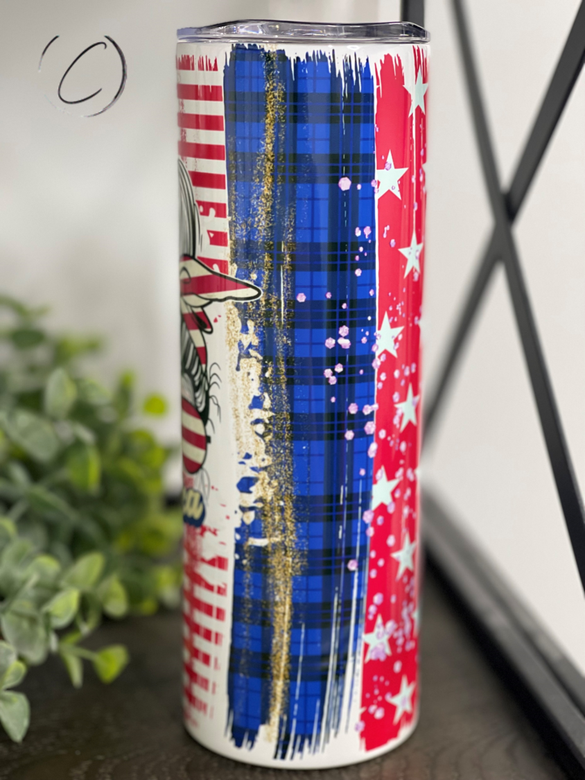 Merica 20oz Skinny Tumbler with full wrap design and reusable straw, showcasing vibrant colors and high-quality material.