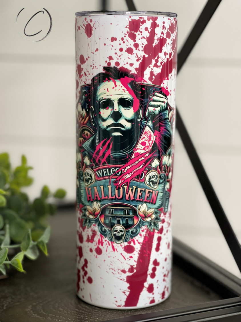 Michael Myers 20oz Skinny Tumbler featuring a full wrap design with iconic horror character.