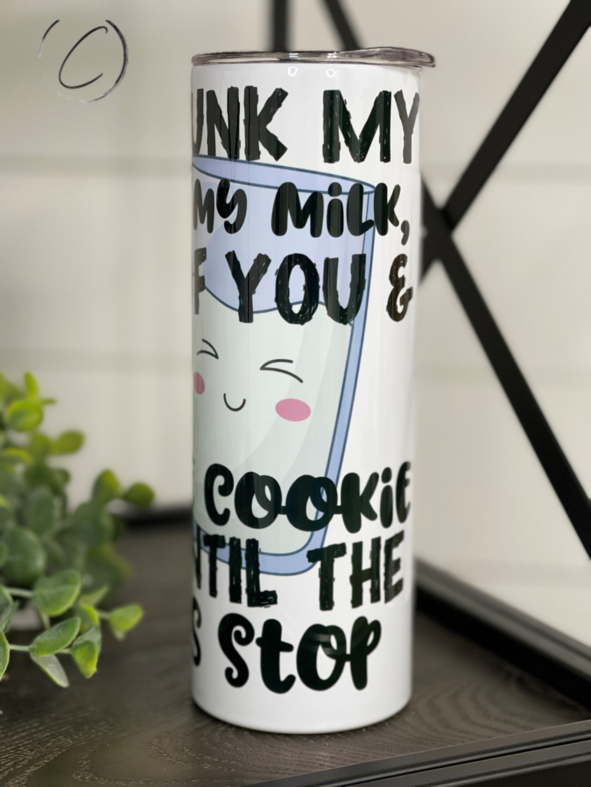 A stylish Milk & Cookies 20oz Skinny Tumbler featuring a whimsical design, perfect for hot and cold beverages.