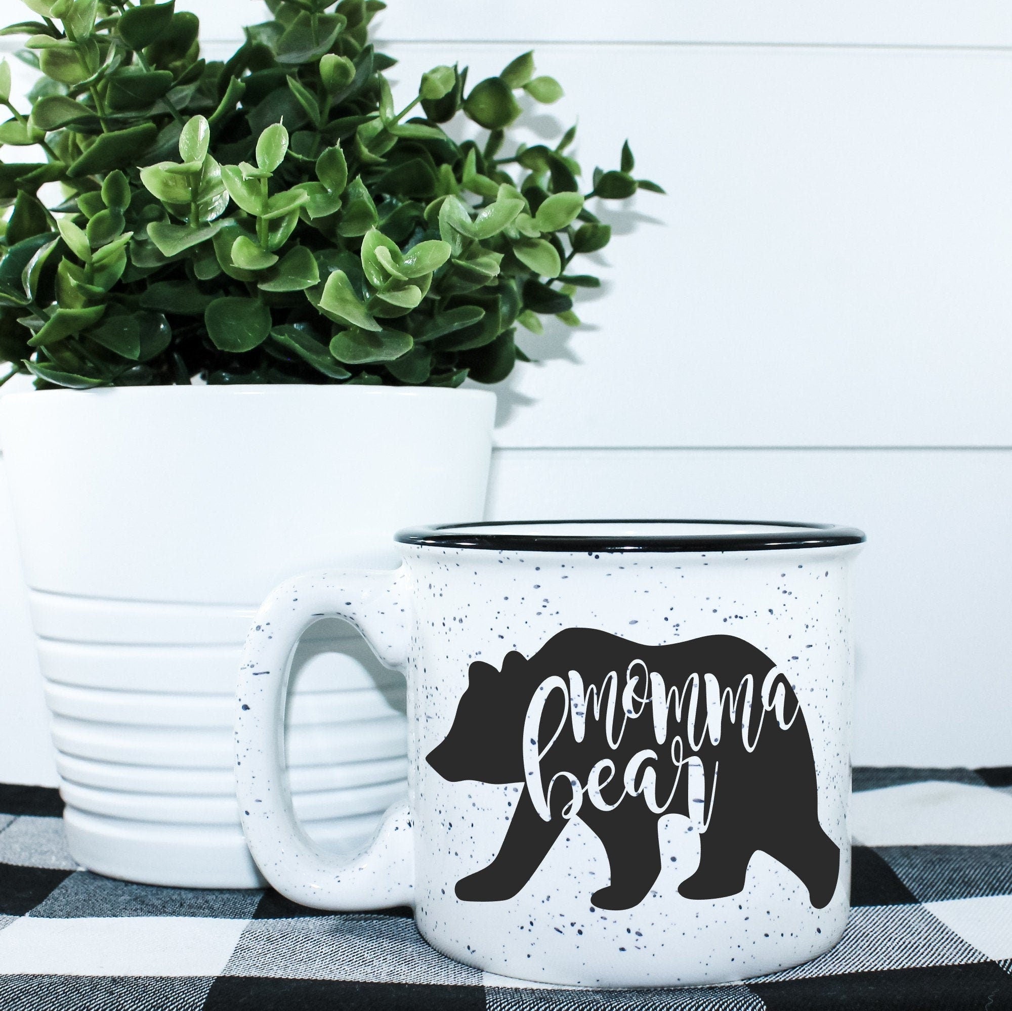 Momma Bear Campfire Mug, a ceramic mug with a unique vinyl design, perfect for outdoor adventures and cozy drinks.