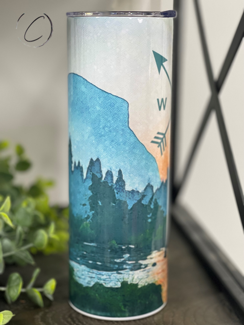 Mountain Compass 20oz Skinny Tumbler featuring a full wrap design, durable construction, and a reusable straw.