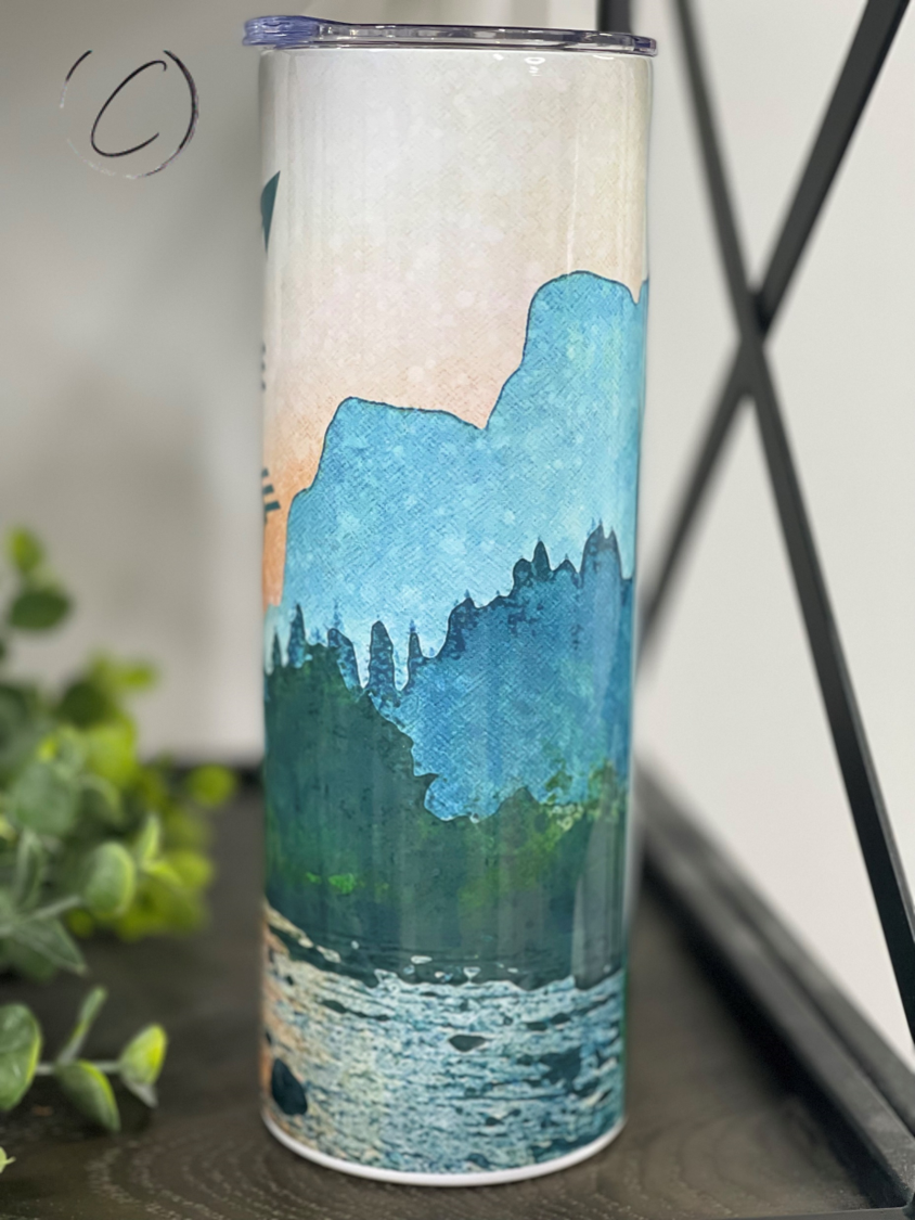 Mountain Compass 20oz Skinny Tumbler featuring a full wrap design, durable construction, and a reusable straw.