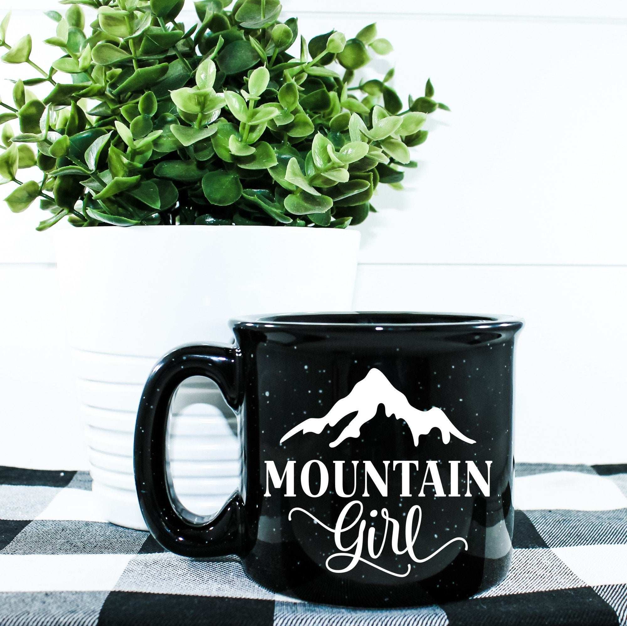 Mountain Girl Campfire Mug, a ceramic mug with a unique design, perfect for outdoor use and stylish enough for home.